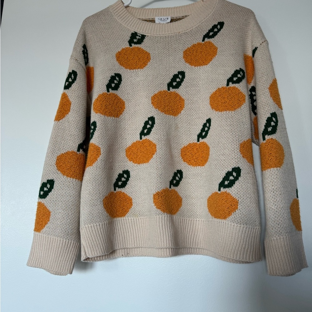 Le Lis Cream Sweater with Orange and Green Design